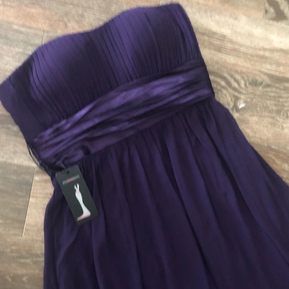 Strapless formal with tags